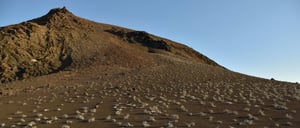 Bartolome in Galapagos Islands view of the volcano and blue sky landscape