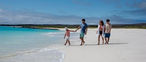 Gardner Bay - Española in the Galapagos view of the white sand beach with tourists living experience