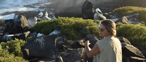 Suarez Point - Española in Galapagos Island Landscape view of the blowhole and tourist looking the masked boobies