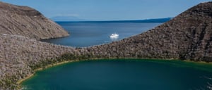 Tagus Cove - Isabela in the Galapagos, view of the Galapagos Legend in the sea over the horizon