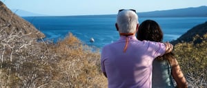 Tagus Cove - Isabela in the Galapagos, couple watching a landscape