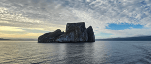 Cerro Brujo - San Cristobal in Galapagos Islands: Sunset at Kicker Rock