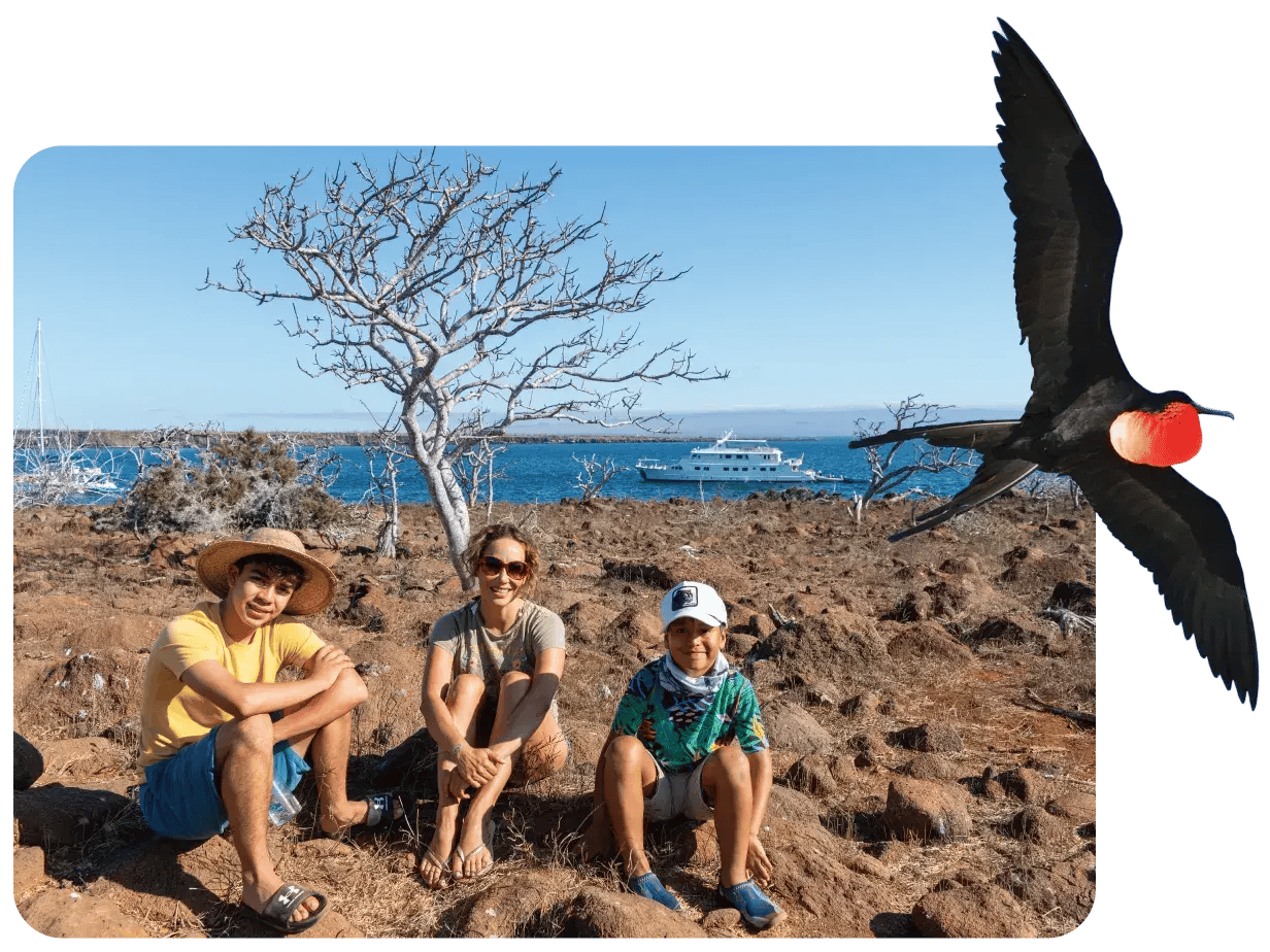 Galapagos Frigate and travelers at the North Seymour Island
